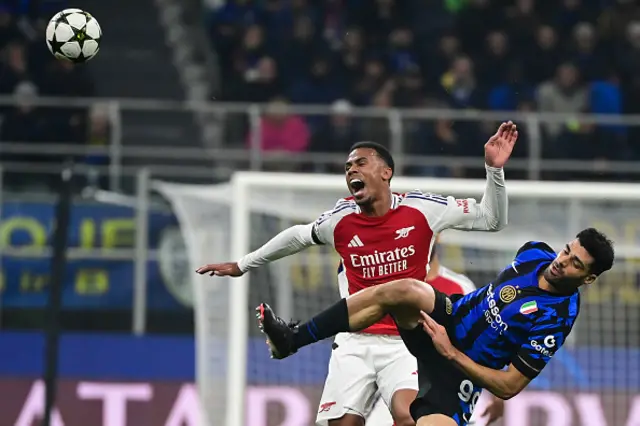 Gabriel Magalhaes of Arsenal FC fights for the ball