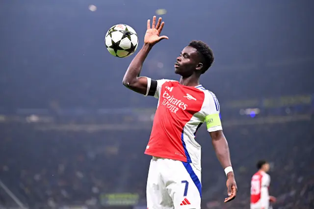 Bukayo Saka of Arsenal catches the ball