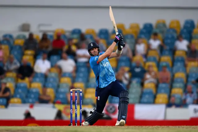 Jamie Overton of England hits out for a six