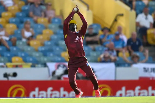 Hayden Walsh of the West Indies catches Sam Curran of England