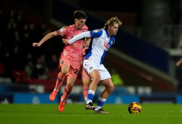 Stoke City's Andy Moran (left) and Blackburn Rovers' Todd Cantwell battle for the ball