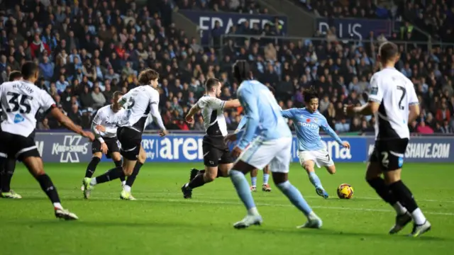 Tatsuhiro Sakamoto of Coventry City scores a goal