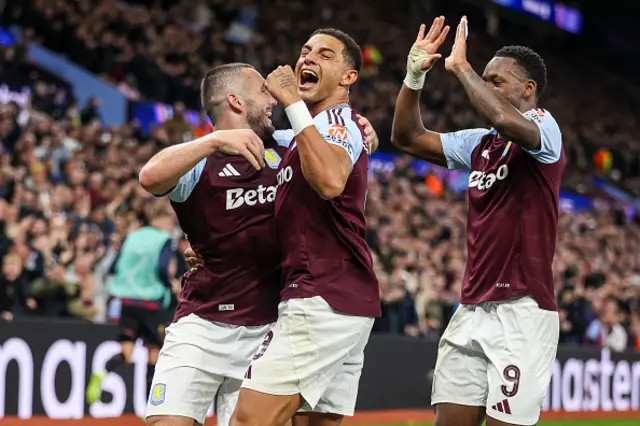 John McGinn celebrates his goal with Diego Carlos, and Jhon Duran