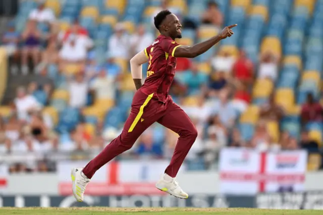 Matthew Forde of the West Indies celebrates dismissing Phil Salt