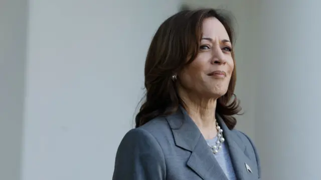 Kamala Harris in a grey suit