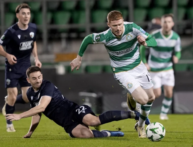 Shamrock Rovers' Darragh Nugent (right) gets past The New Saints' Daniel Davies