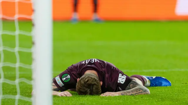 Hearts' Frankie Kent looks dejected as his header goes wide of the target