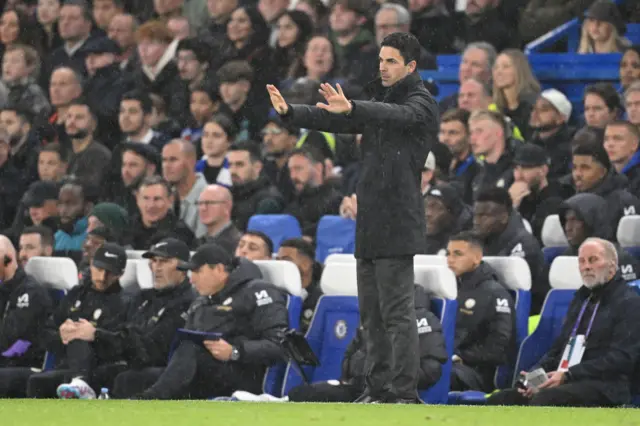 Mikel Arteta, Manager of Arsenal, gestures during the Premier League match between Chelsea FC and Arsenal FC at Stamford Bridge on October 21, 2023