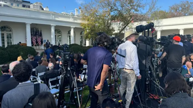 Press members set up cameras in Rose Garden ahead of Joe Biden speech