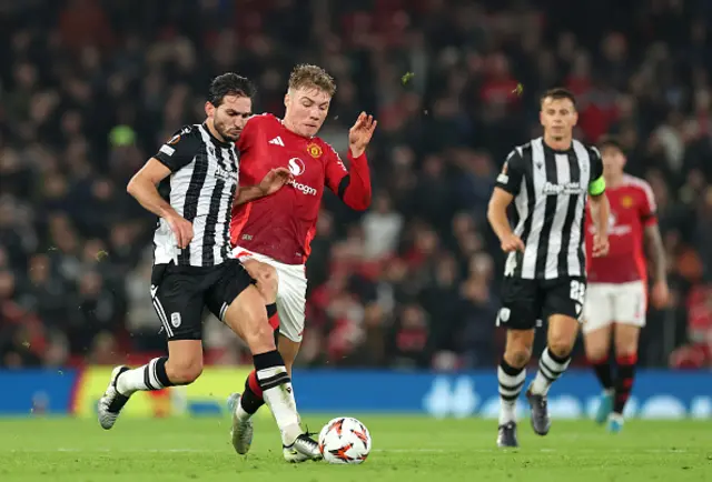 Magomed Ozdoev of PAOK FC controls the ball whilst under pressure from Rasmus Hojlund