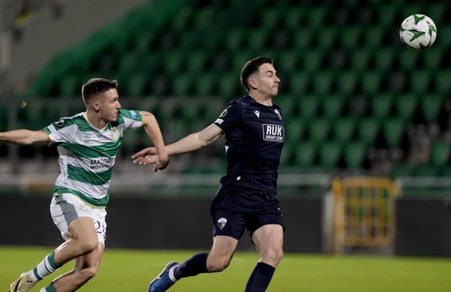 The New Saints' Daniel Davies (right) and Shamrock Rovers' Johnny Kenny (left) battle for the ball