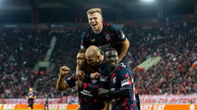 ATHENS, GREECE - NOVEMBER 07: Rangers' Cyriel Dessers celebrates with Vaclav Cerny, Mohamed Diomande and Connor Barron as he scores to make it 1-1 during a UEFA Europa League 2024/25 League Phase MD4 match between Olympiacos and Rangers at The Georgios Karaiskakis Stadium, on November 07, 2024, in Athens, Greece. (Photo by Alan Harvey / SNS Group)