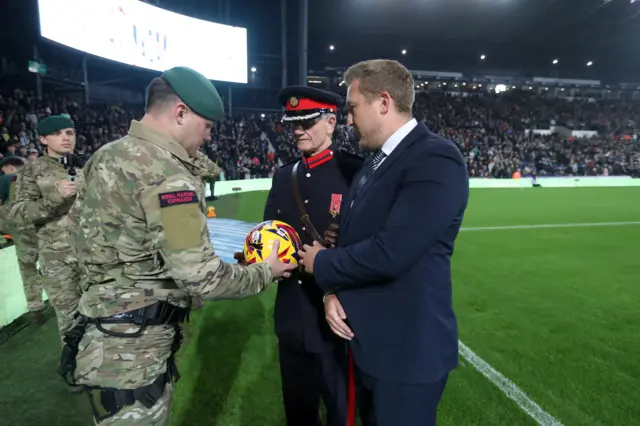 Dave Heeley receives match ball