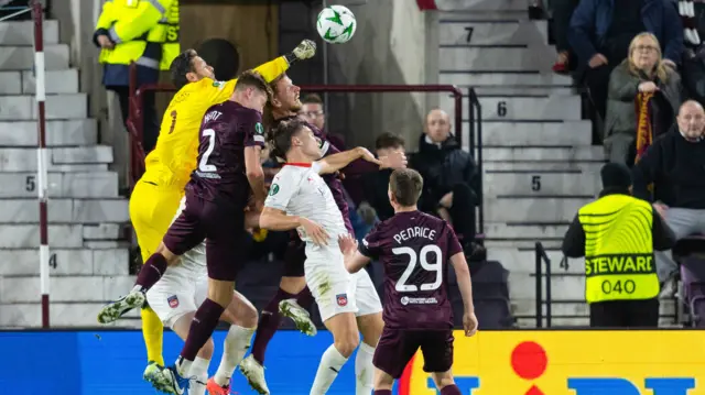 Hearts' Craig Gordon punches the ball clear