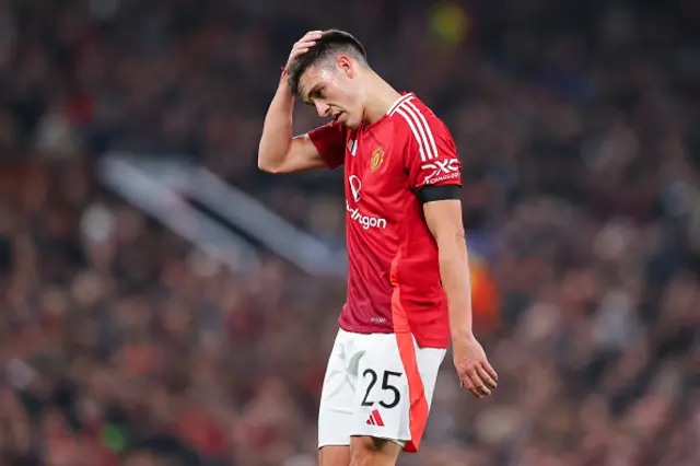 Manuel Ugarte of Manchester United looks dejected