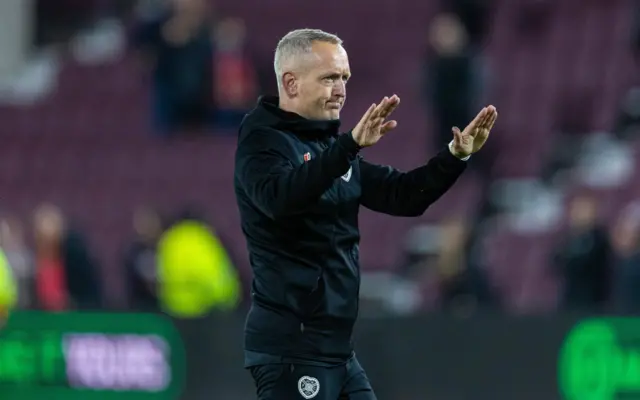 EDINBURGH, SCOTLAND - NOVEMBER 07: Hearts Head Coach Neil Critchley looks dejected at full time during a UEFA Conference League 2024/25 League Phase MD3 match between Heart of Midlothian and Heidenheim at Tynecastle Park, on Novemeber 07, 2024, in Edinburgh, Scotland. (Photo by Mark Scates / SNS Group)