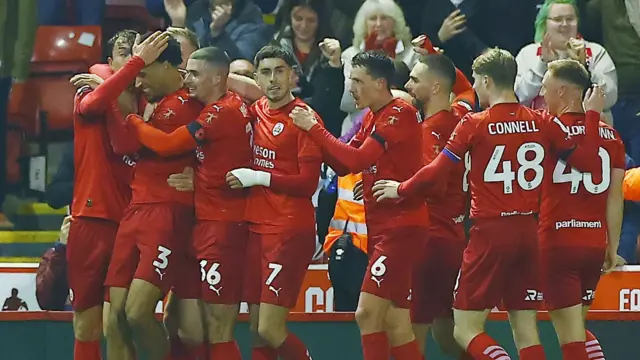 Barnsley celebrate John Russell's goal against Rotherham