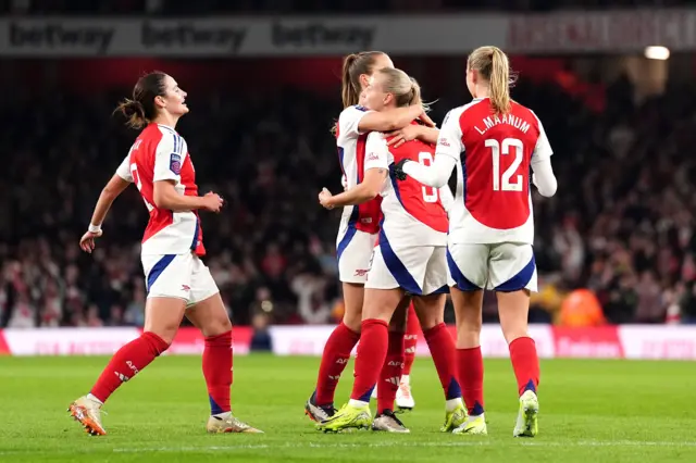 Beth Mead is congratulated by teammates after scoring against Brighton