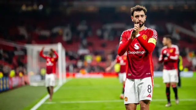 Bruno Fernandes of Manchester United applauds fans