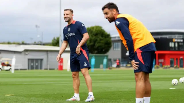 Luke Shaw and Bruno Fernandes in training with Manchester United