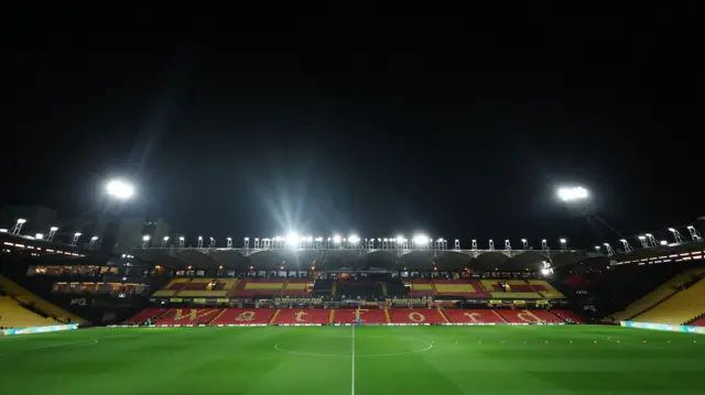 Watford's Vicarage Road stadium under the floodlights