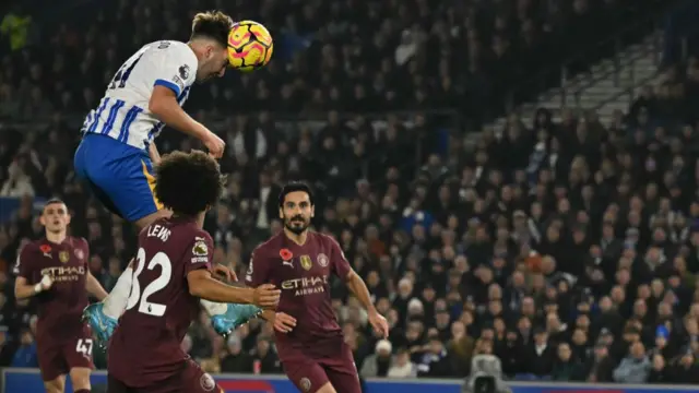 Brighton's English midfielder #41 Jack Hinshelwood has this headed attempt saved