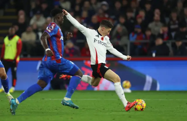 Harry Wilson scores Fulham's second goal of the game against Crystal Palace.