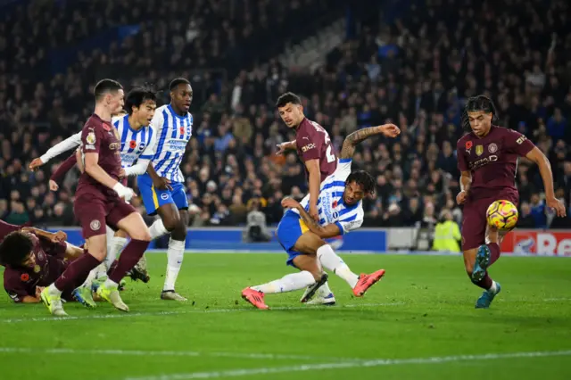 Joao Pedro spins and shoots in a sea of bodies to equalise for Brighton