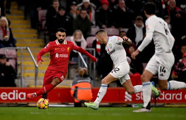 Mo Salah takes on Lucas Digne