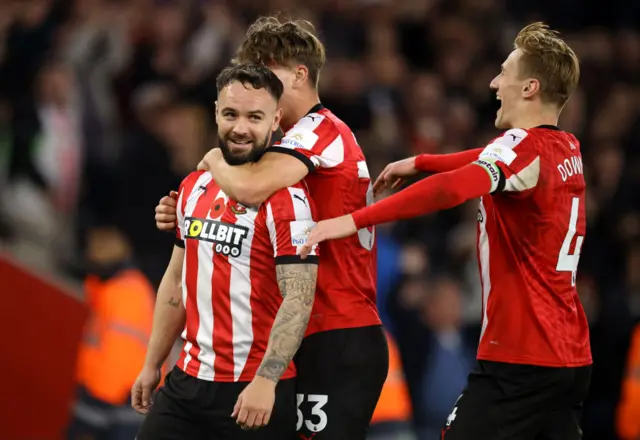 Adam Armstrong celebrating with Southampton team-mates