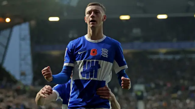 Jay Stansfield celebrates in front of the Birmingham fans