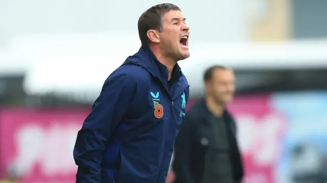 Mansfield manager Nigel Clough shouts instructions from the touchline