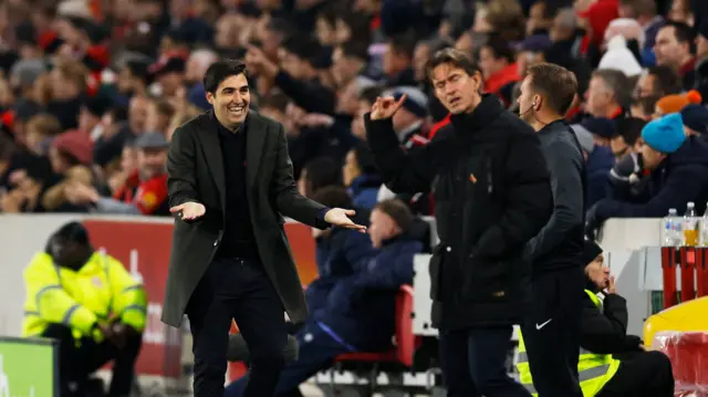 AFC Bournemouth manager Andoni Iraola talks to Brentford manager Thomas Frank.