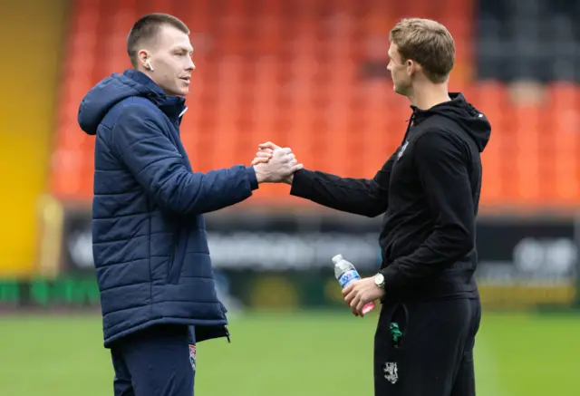 Ross County's Kacper Lopata and Dundee United's Sam Dalby