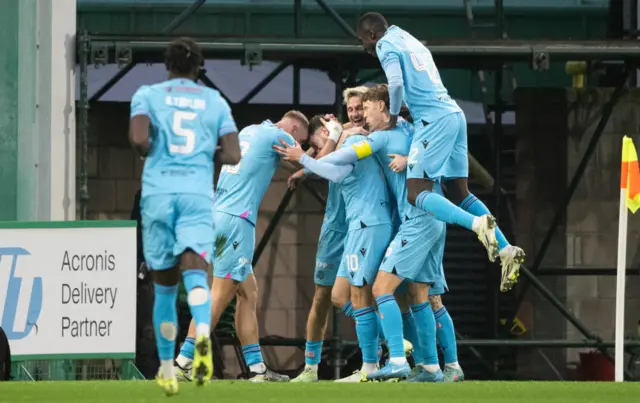 McMenamin and his teammates celebrate his opener