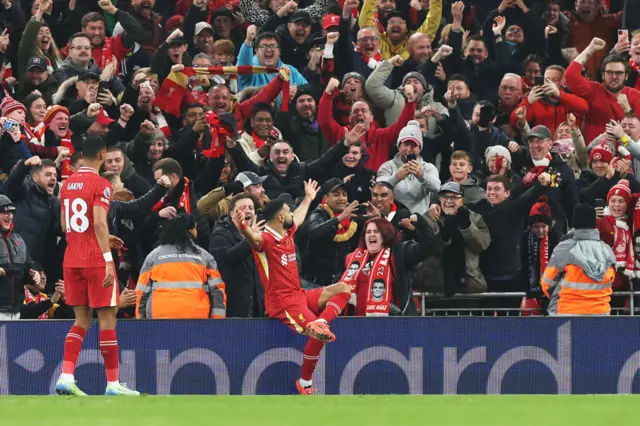 Mohamed Salah celebrates after putting Liverpool 2-0 in front