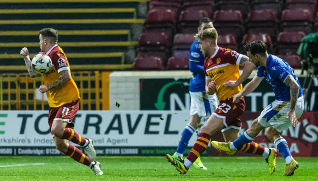 St Johnstone's Graham Carey fins his shot blocked by Andy Halliday's arm which results in a penalty for St Johnstone during a William Hill Premiership match between Motherwell and St Johnstone at Fir Park