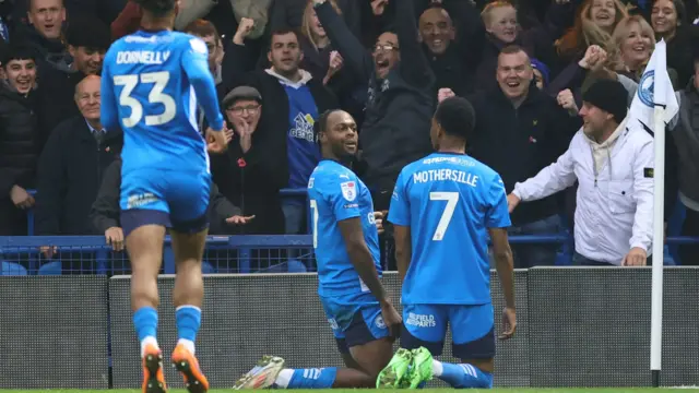 Peterborough celebrate Ricky-Jade Jones' goal against Cambridge