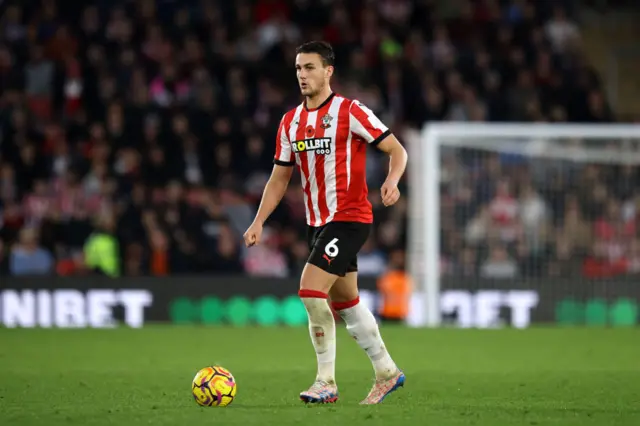 Southampton defender Taylor Harwood-Bellis on the ball