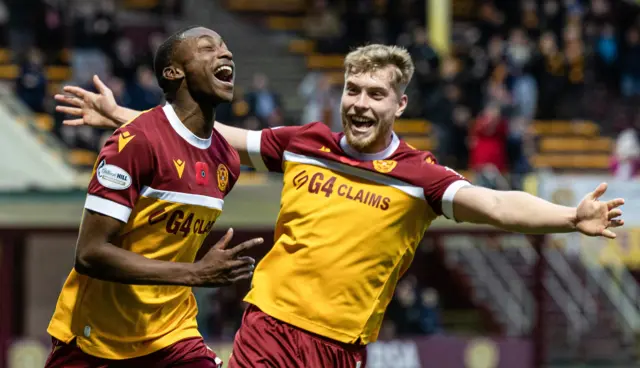 Motherwell's Tawanda Maswanhise celebrates with Ewan Wilson as he scores to make it 1-0 during a William Hill Premiership match between Motherwell and St Johnstone at Fir Park