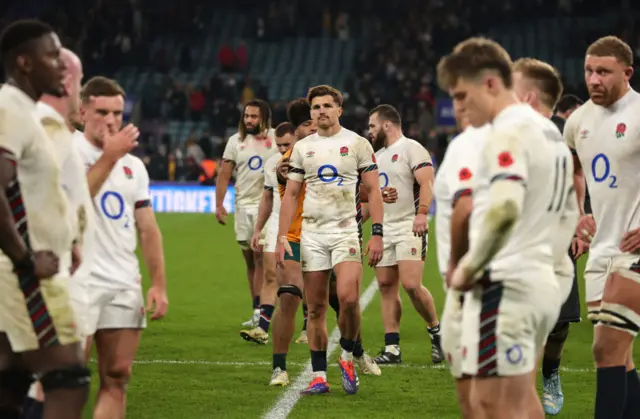 England players looking disappointed after a defeat to Australia