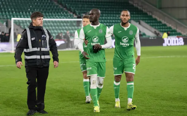 Eli Youan and Jordan Obita leave the pitch