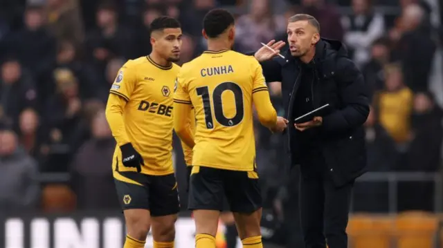 Gary O'Neil gives instructions to his Wolves players