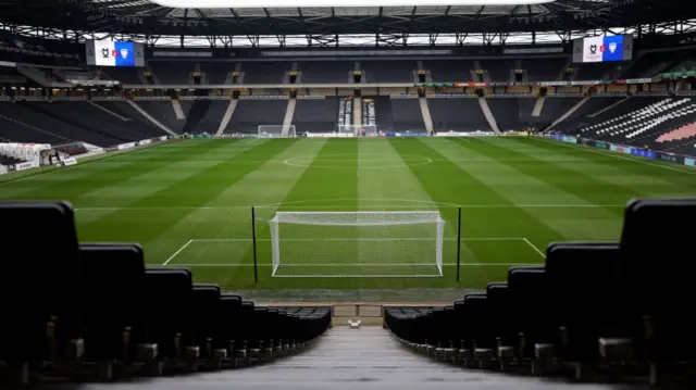 View of Stadium MK pitch from behind the goal