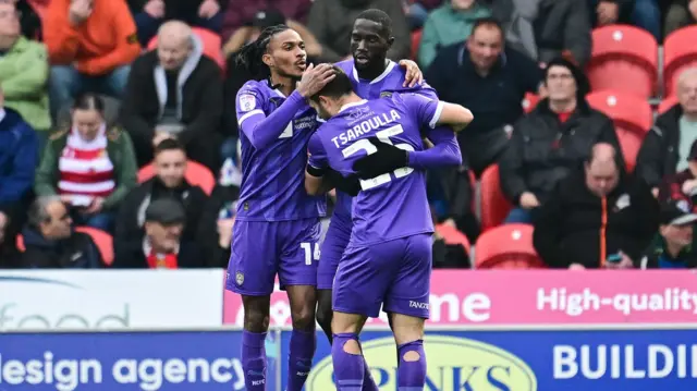 Notts County's Alassana Jatta celebrates his opener at Doncaster