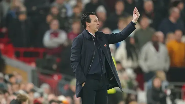 Aston Villa manager Unai Emery encourages his side