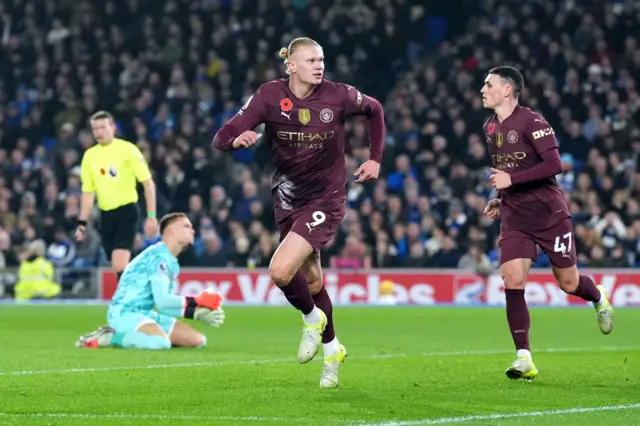 Erling Haaland wheels away to celebrate his goal