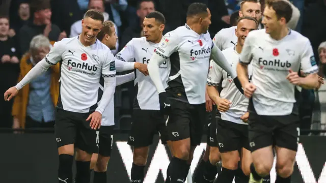 Derby celebrate scoring