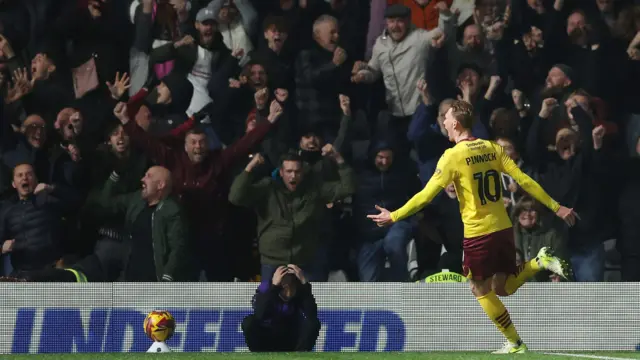 Mitch Pinnock celebrates in front of the Northampton fans