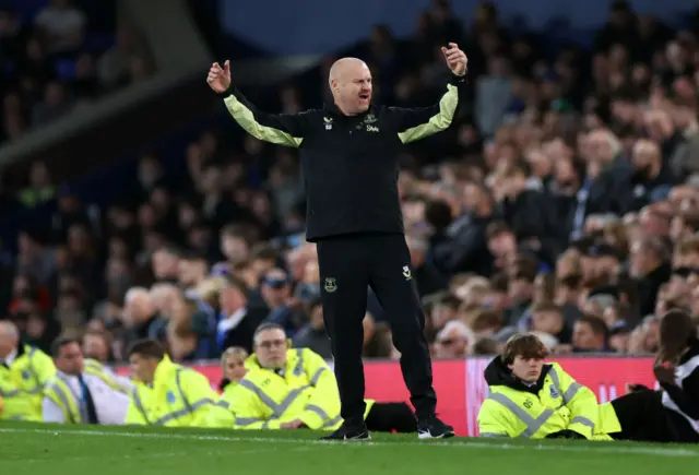 Everton boss Sean Dyche with his arms in the air